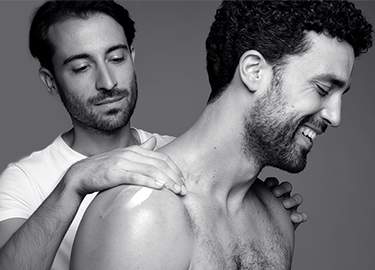 Oncology Two men support mobile image